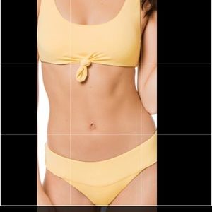 Becca yellow Bikini set Top (M) Bottoms (Large)